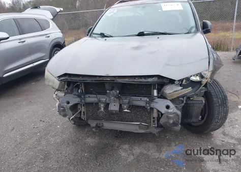 2010 Mitsubishi Outlander Xls z USA, uszkodzony, nr VIN JA4JS4AX4AZ002472